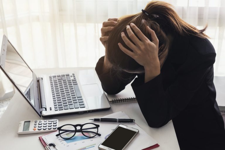 Stressed and frustrated asian business woman